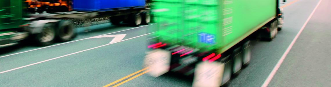 green truck road speeding