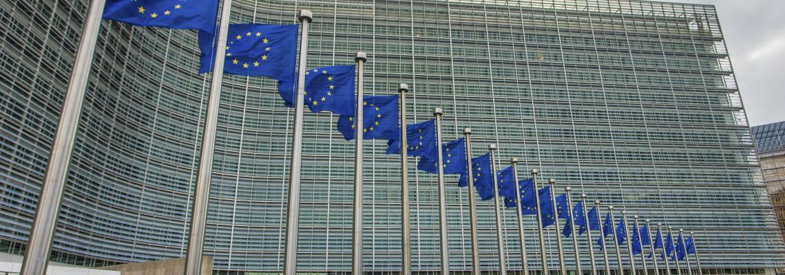 EU flags in front of the European Commission building