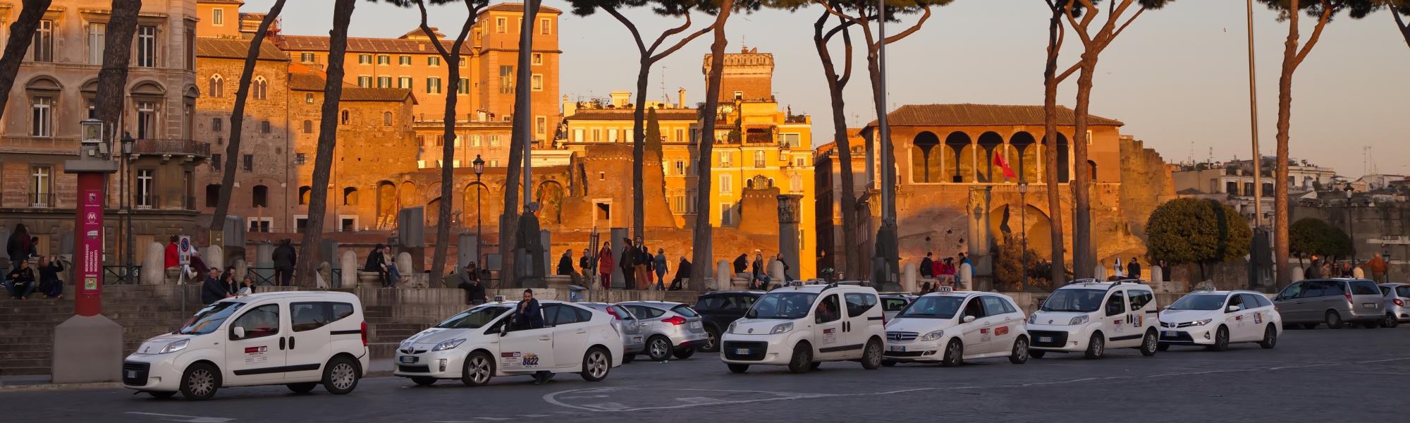 rome dusk taxis lining up