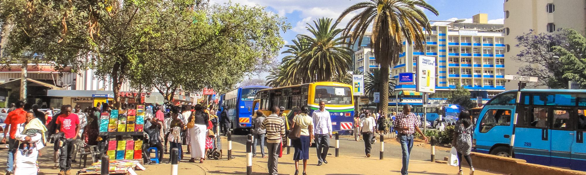 buses in central Nairobi Kenya with people