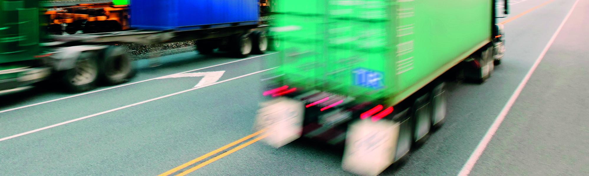 green truck road speeding