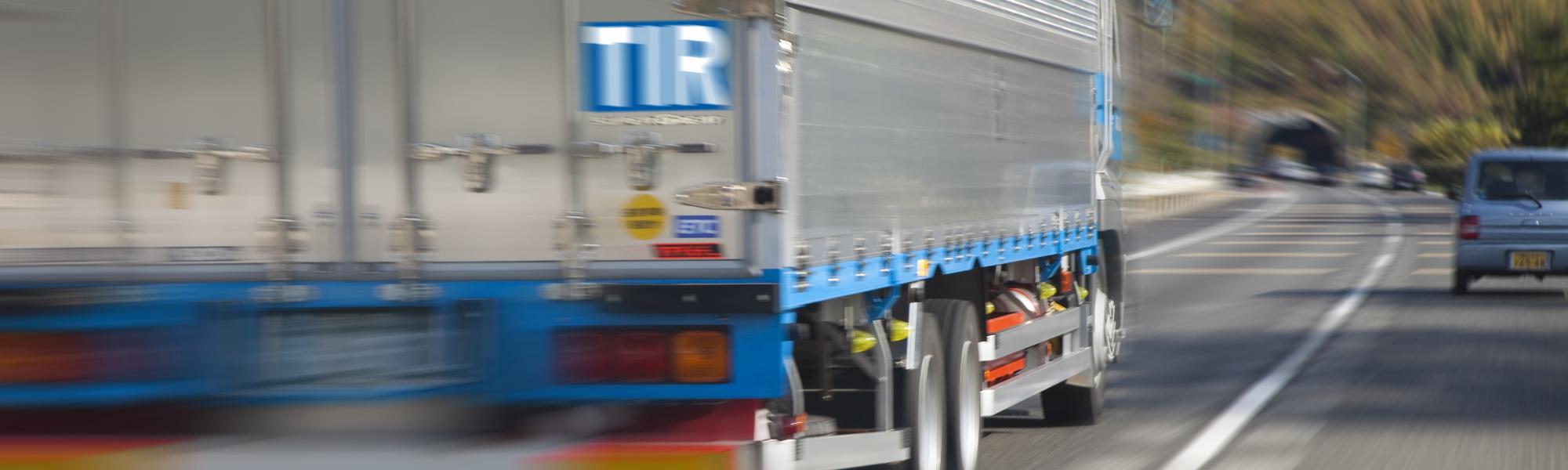 truck with TIR logo on the move