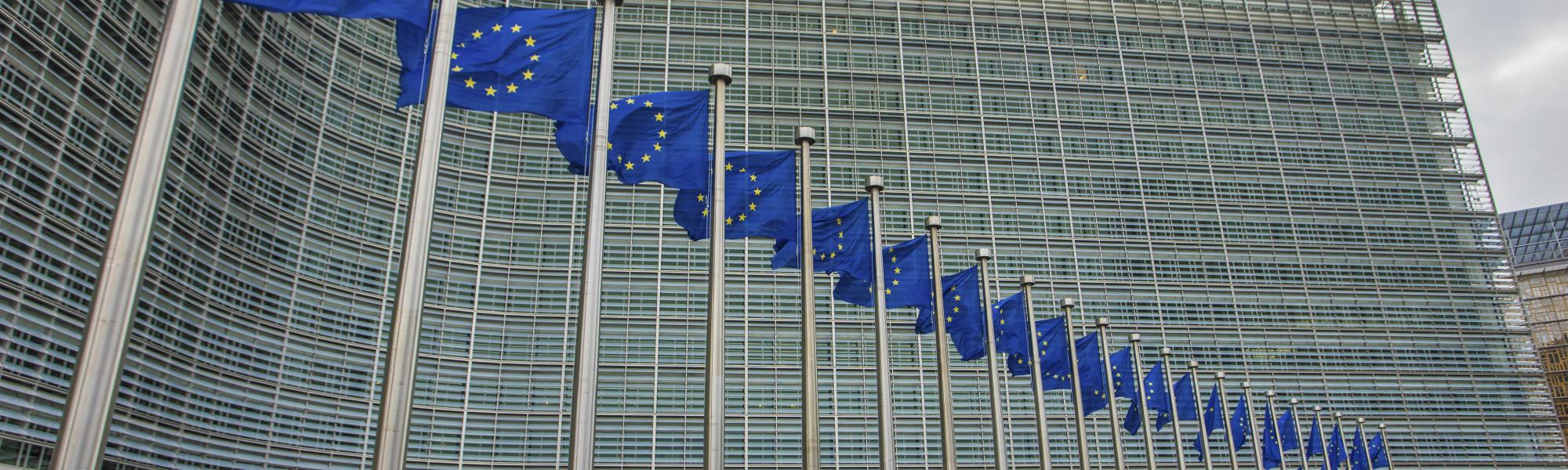 EU flags in front of the European Commission building