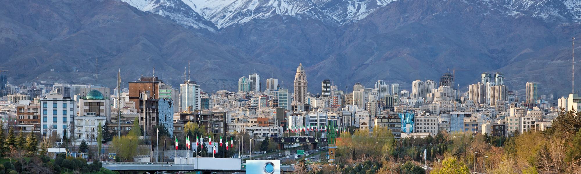 Tehran road and mountains with city