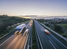 trucks speeding at dusk