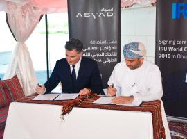 Umberto de Pretto signing agreement Oman