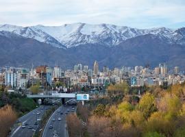 Tehran road and mountains with city